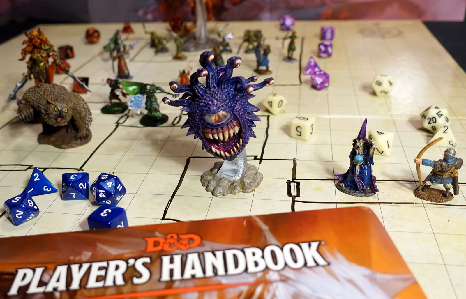 D&D battle grid with a beholder miniature